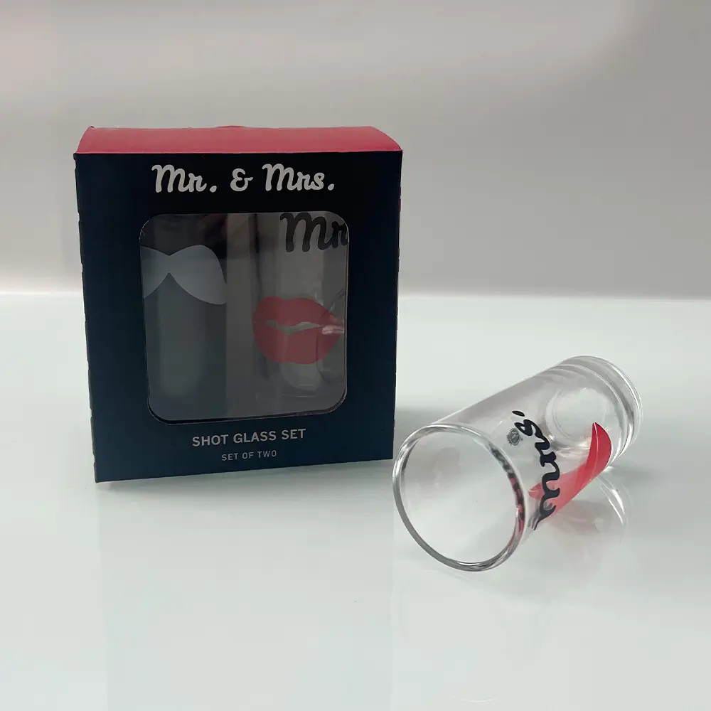 Mr. & Mrs. Glassware Pair Romantic wedding favor gift idea: personalized Mr. & Mrs. drinking glasses with acrylic holder.