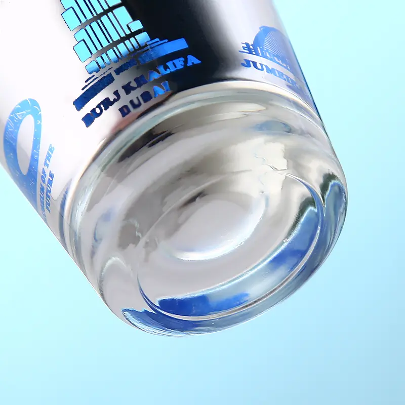 Blue electroplated shot glass showing thick base and clear glass construction