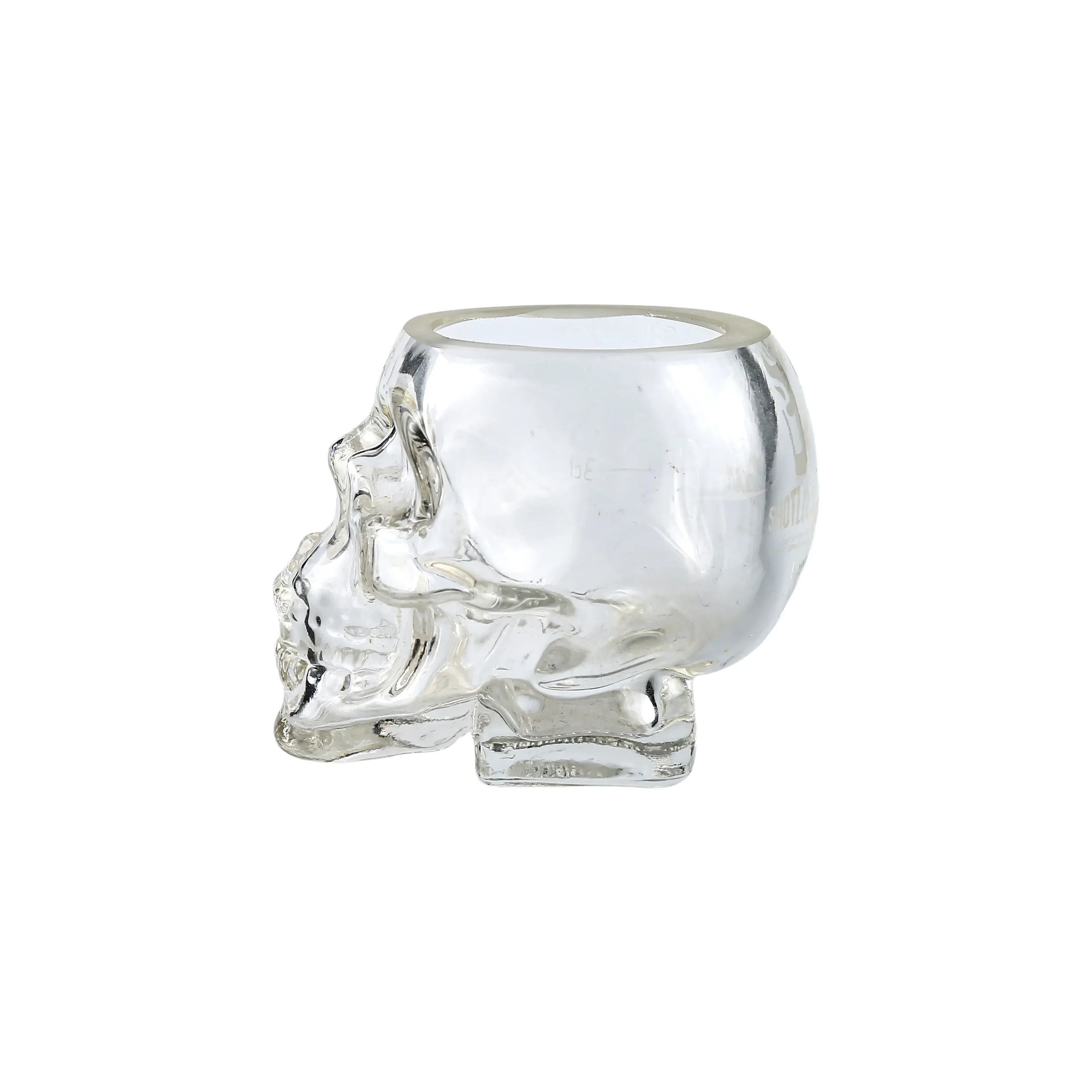 Side view of a clear glass skull shot glass showing dimensions 65 mm height and 96 ml capacity for whiskey drinking.