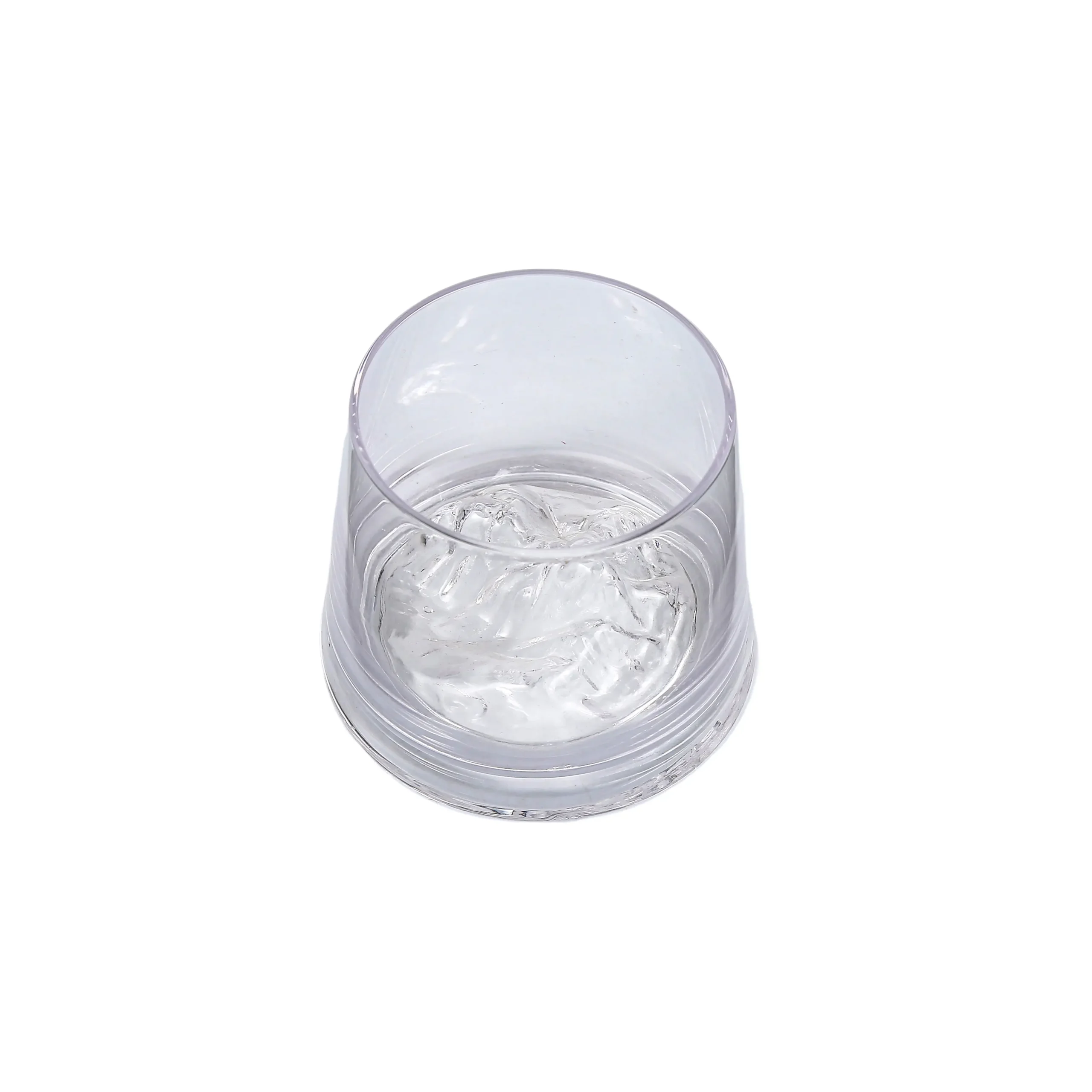 Luxury bourbon whiskey glass with mountain landscape inside