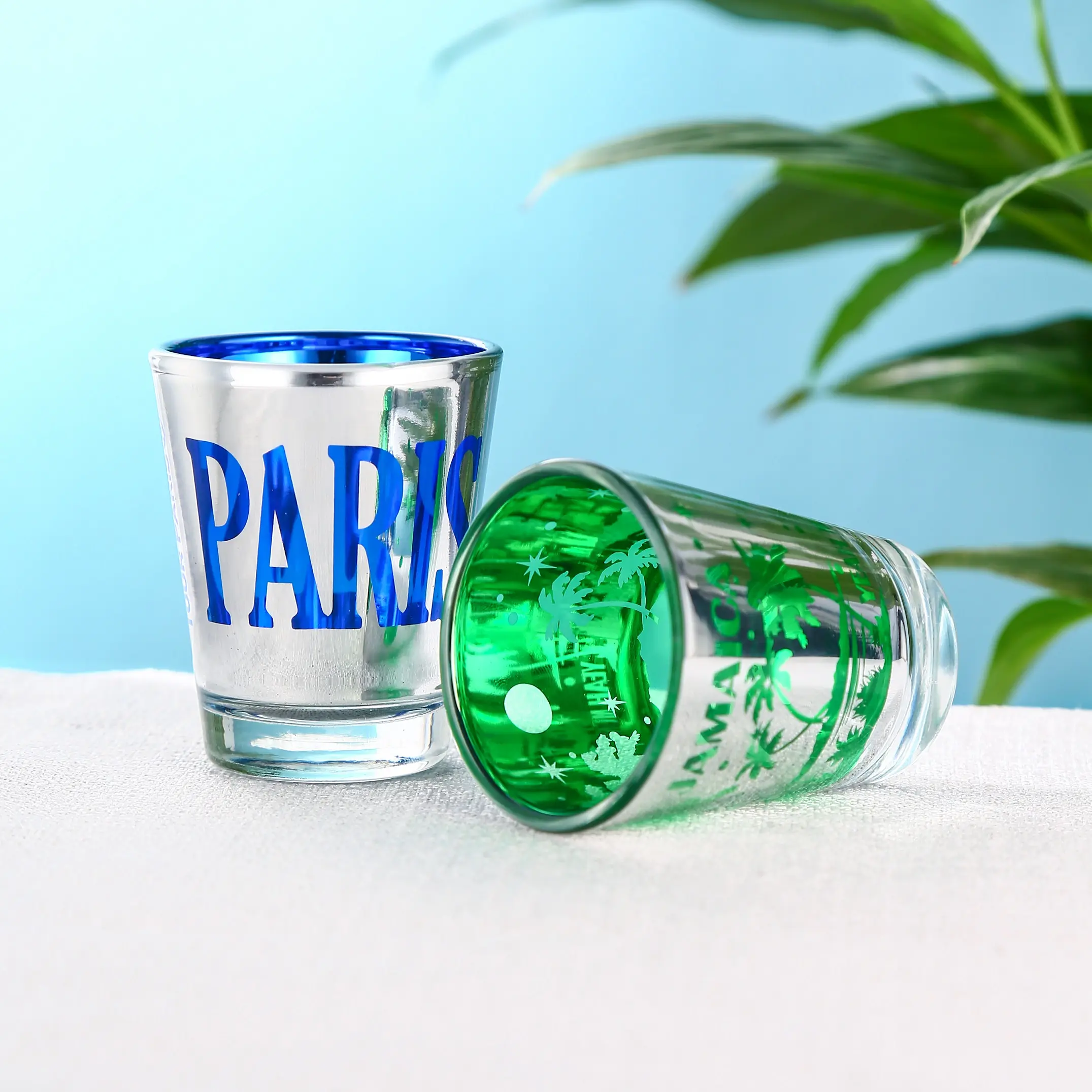 custom-colored-electroplated-shot-glass-green-detail Custom green electroplated shot glass with detailed decorative finish