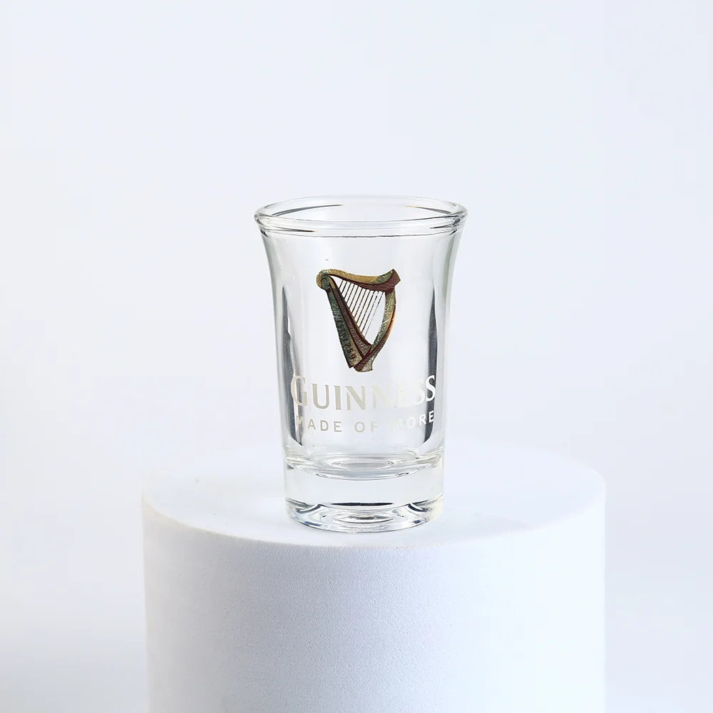Custom heavy base shot glass with clear glass construction and logo decoration