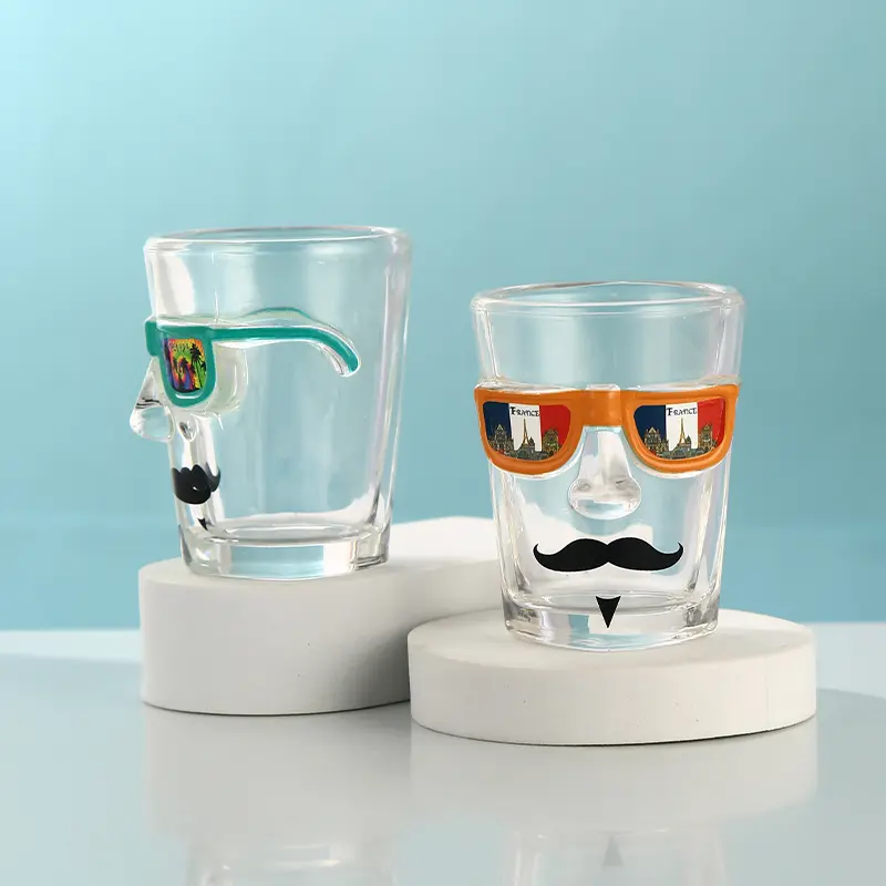 Side view of custom face shot glass with sunglasses decoration