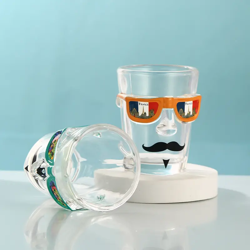 Custom face shot glass showing glass thickness and interior detail
