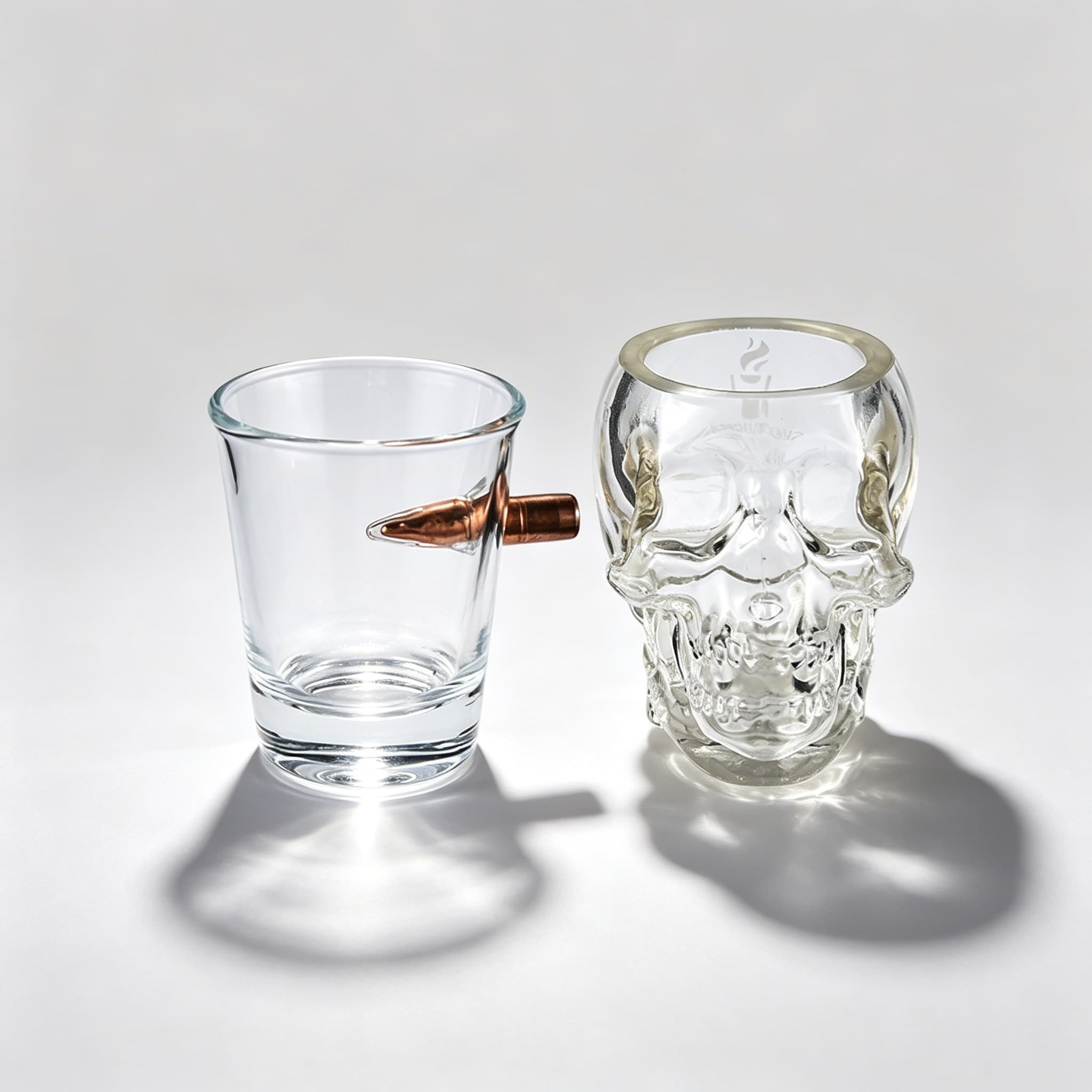 Skull and bullet novelty shot glasses with unique sculpted designs
