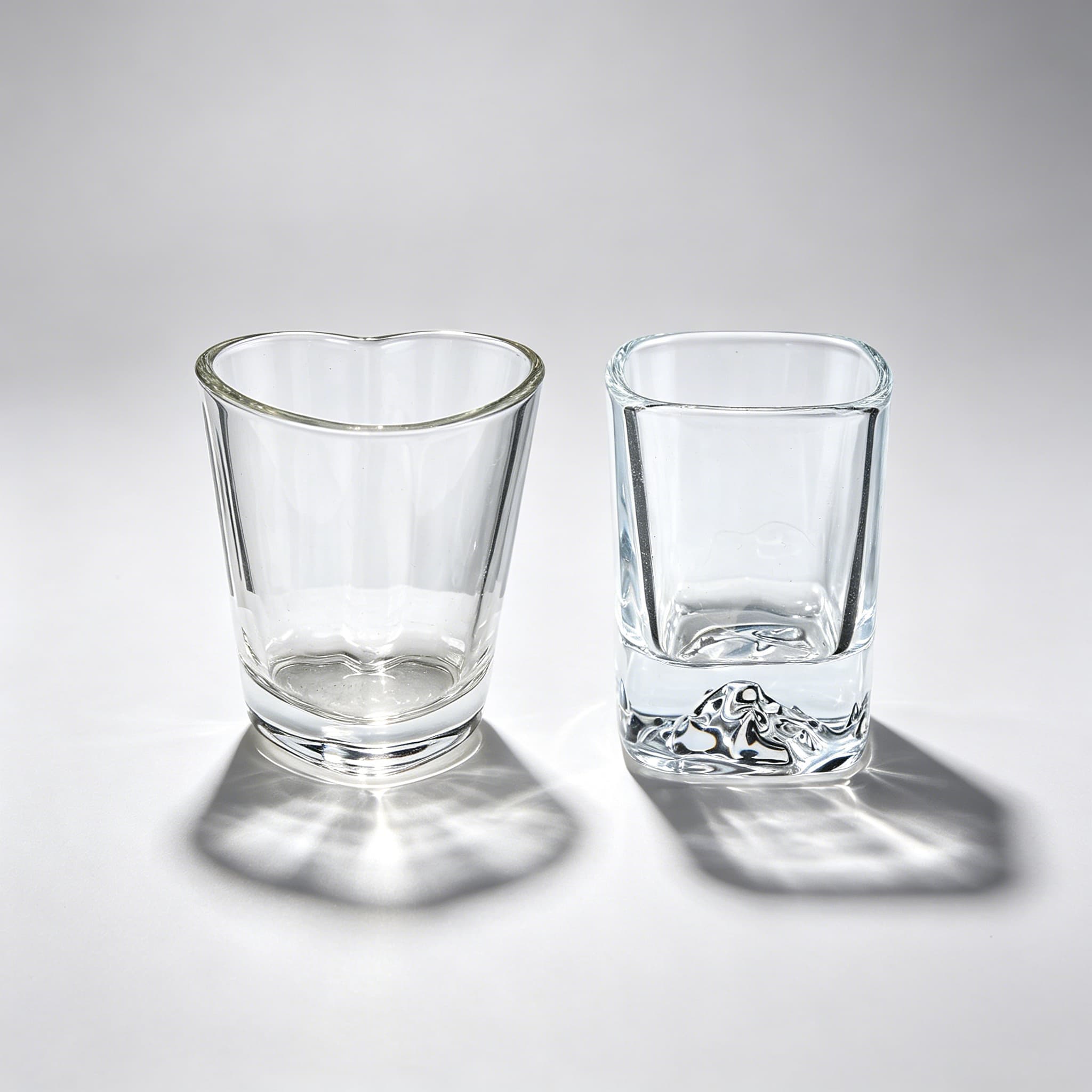 Square and heart shaped shot glasses with unique novelty designs
