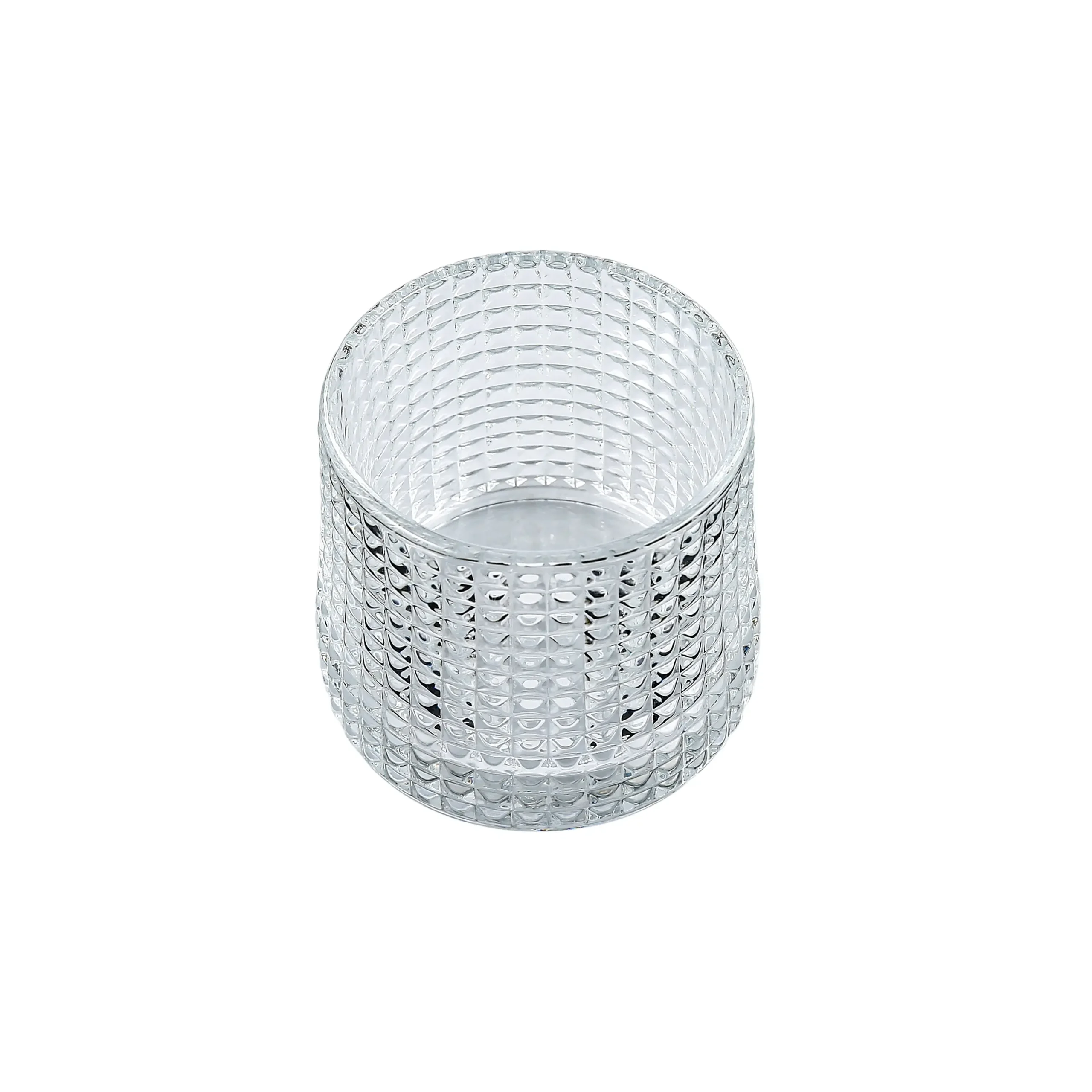 Top view of textured whiskey glass highlighting the intricate diamond texture and self-righting tumbler base
