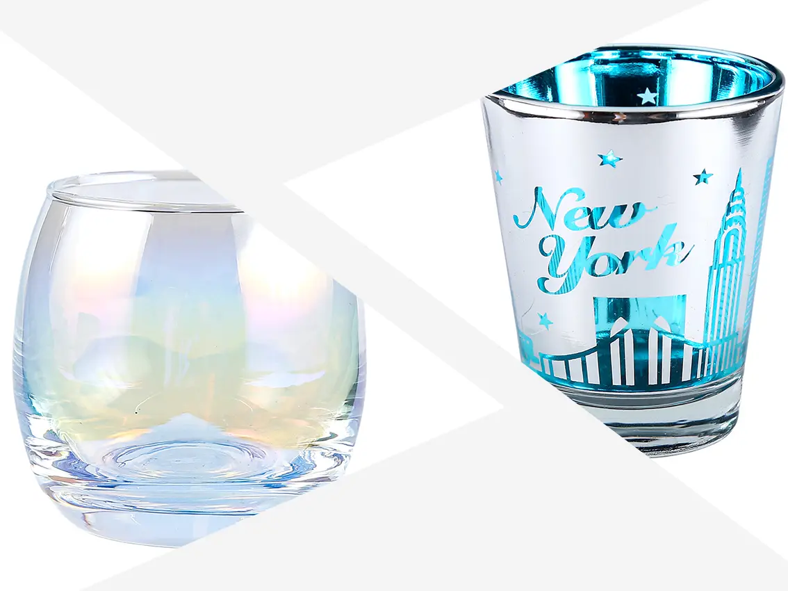 Custom electroplated and iridescent spray-colored glasses for barware branding.